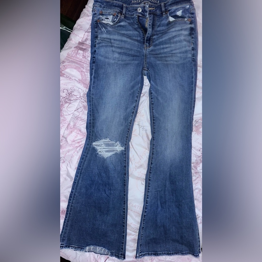 American Eagle super high rise next level flare medium wash distressed size 8 r